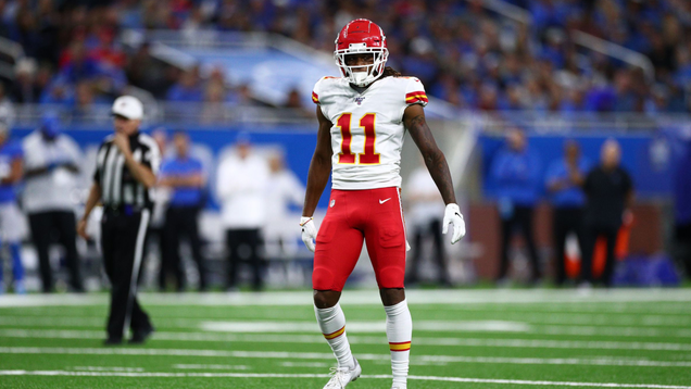 The enthralling, hypnotic referee Walt Anderson plies his trade during the Week 4 Kansas City Chiefs–Detroit Lions game. Also pictured: Kansas City Chiefs wide receiver Demarcus Robinson.